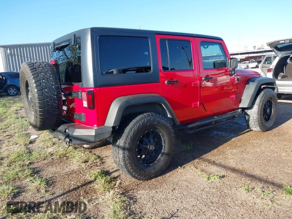 2015 Jeep Wrangler Unlimited Willys Wheeler with VIN 1C4BJWDG0FL635341, listed as a IAAI auction lot 41955393 with 145,529 mi miles and . Bid and sale history available at DreamBid. Image 4.