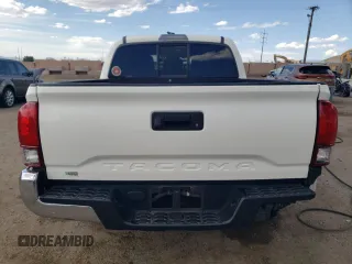 2021 Toyota Tacoma SR with VIN 3TYAX5GN5MT015924, listed as a Copart auction lot 59523615 with 79,693 mi miles and Salvage title. Bid and sale history available at DreamBid. Image 6.