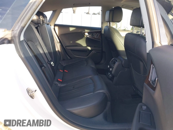 2013 Audi A7 Prestige with VIN WAU3GAFC0DN090191, listed as a IAAI auction lot 41209982 with 138,578 mi miles and . Bid and sale history available at DreamBid. Image 8.