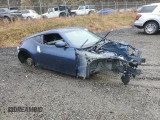 2014 Nissan 370Z with VIN JN1AZ4EH9EM631400, listed as a Copart auction lot 51304805 with 0 mi miles and Salvage Title. Bid and sale history available at carsss.com. Image 4.