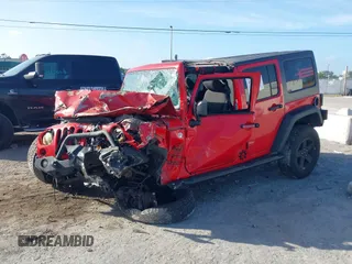 2015 Jeep Wrangler Unlimited Sport with VIN 1C4BJWDG4FL694005, listed as a IAAI auction lot 41971529 with Not provided miles and . Bid and sale history available at DreamBid. Image 17.