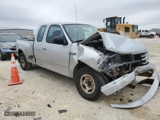 2003 Ford F-150 XL with VIN 1FTRX07293KD87683, listed as a Copart auction lot 45412605 with 0 mi miles and Salvage Title. Bid and sale history available at carsss.com. Image 4.