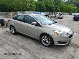 2015 Ford Focus SE z VIN 1FADP3F29FL312757, wystawiony jako Copart lot #61198315 z przebiegiem 84 944 mil mil oraz Szkoda całkowita • Salvage title. Historia ofert i sprzedaży dostępna na DreamBid. Obrazek 4.
