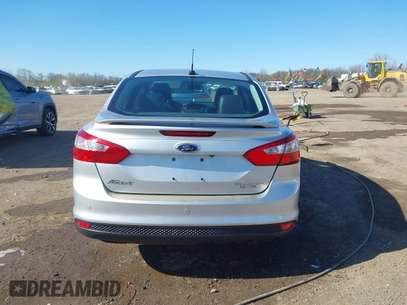 2014 Ford Focus Titanium with VIN 1FADP3J28EL354505, listed as a IAAI auction lot 42025966 with 104,868 mi miles. Bid and sale history available at carsss.com. Image 17.