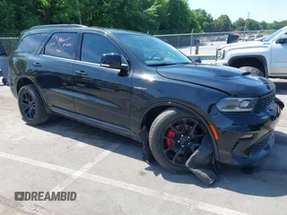 2023 Dodge Durango R/T z VIN 1C4SDJCT6PC585376, wystawiony jako IAAI lot #42435574 z przebiegiem 38 244 mil mil oraz . Historia ofert i sprzedaży dostępna na DreamBid. Obrazek 1.