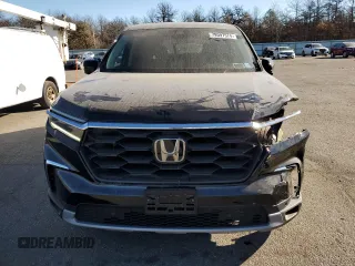 2023 Honda Pilot EX-L 7 Passenger with VIN 5FNYG1H52PB013462, listed as a Copart auction lot 79597574 with 25,302 mi miles and Salvage Title. Bid and sale history available at carsss.com. Image 5.