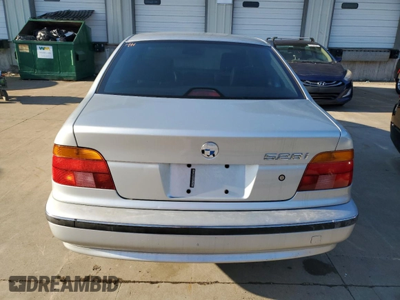 1999 BMW 5 Series 528iA with VIN WBADM6331XBY22302, listed as a Copart auction lot 43232585 with 196,519 mi miles and Clean Title. Bid and sale history available at carsss.com. Image 6.