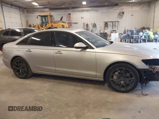 2014 Audi A6 Premium Plus with VIN WAUFGAFC7EN146819, listed as a IAAI auction lot 42072873 with 151,036 mi miles and . Bid and sale history available at DreamBid. Image 13.