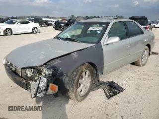 2000 Toyota Camry CE with VIN JT2BG22K1Y0443065, listed as a Copart auction lot 43620775 with 138,329 mi miles and Salvage Title. Bid and sale history available at carsss.com. Image 1.