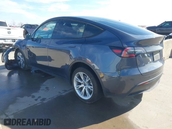 2023 Tesla Model Y Long Range with VIN 7SAYGDEE1PA060410, listed as a IAAI auction lot 41357943 with 19,072 mi miles. Bid and sale history available at carsss.com. Image 3.