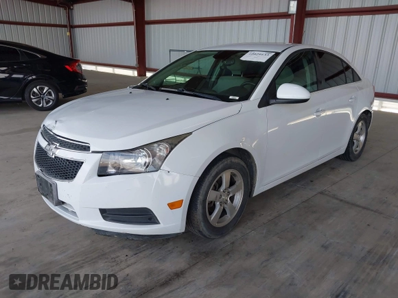 2014 Chevrolet Cruze 1LT with VIN 1G1PC5SB2E7226761, listed as a IAAI auction lot 42029133 with 153,738 mi miles and . Bid and sale history available at DreamBid. Image 2.
