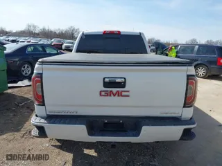 2017 GMC Sierra 1500 Denali with VIN 3GTU2PEJ5HG239623, listed as a IAAI auction lot 41783709 with 61,641 mi miles. Bid and sale history available at carsss.com. Image 16.