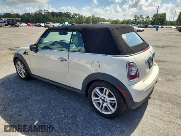 2011 MINI Convertible with VIN WMWZN3C59BTZ78433, listed as a Copart auction lot 65509575 with 102,800 mi miles and Clean title. Bid and sale history available at DreamBid. Image 2.