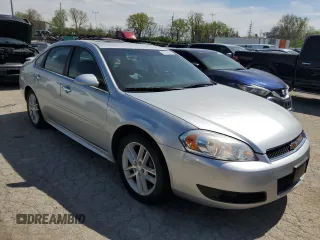 2012 Chevrolet Impala LTZ with VIN 2G1WC5E37C1291499, listed as a Copart auction lot 50063664 with 173,454 mi miles and Salvage Title. Bid and sale history available at DreamBid. Image 4.