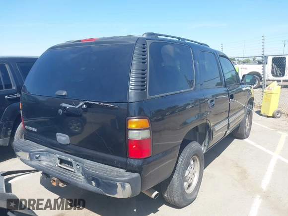 2006 Chevrolet Tahoe LS with VIN 1GNEC13V96R167740, listed as a IAAI auction lot 42384289 with 242,572 mi miles and . Bid and sale history available at DreamBid. Image 4.