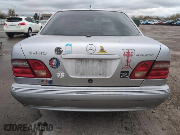 2002 Mercedes-Benz E-Class AWD with VIN WDBJF83J62X072710, listed as a Copart auction lot 54703715 with 114,435 mi miles and Clean Title. Bid and sale history available at carsss.com. Image 7.