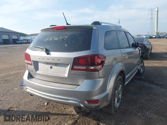 2017 Dodge Journey Crossroad Plus with VIN 3C4PDDGG4HT577982, listed as a IAAI auction lot 42276317 with 163,517 mi miles and . Bid and sale history available at DreamBid. Image 4.