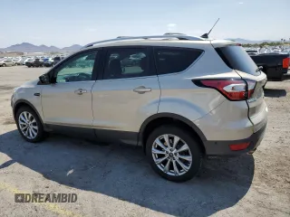 2018 Ford Escape Titanium with VIN 1FMCU9J91JUB44813, listed as a Copart auction lot 59920265 with 63,008 mi miles and Salvage title. Bid and sale history available at DreamBid. Image 2.