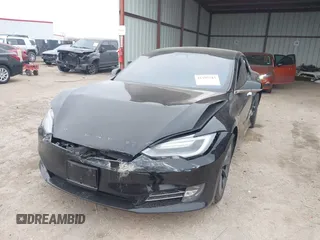 2018 Tesla Model S 75D with VIN 5YJSA1E22JF282828, listed as a IAAI auction lot 41595543 with 72,571 mi miles and . Bid and sale history available at DreamBid. Image 16.