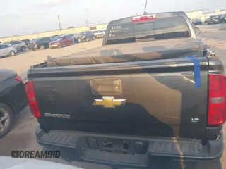 2016 Chevrolet Colorado 2WD LT z VIN 1GCGSCE37G1374901, wystawiony jako IAAI lot #41463562 z przebiegiem 163 716 mil mil oraz . Historia ofert i sprzedaży dostępna na DreamBid. Obrazek 16.