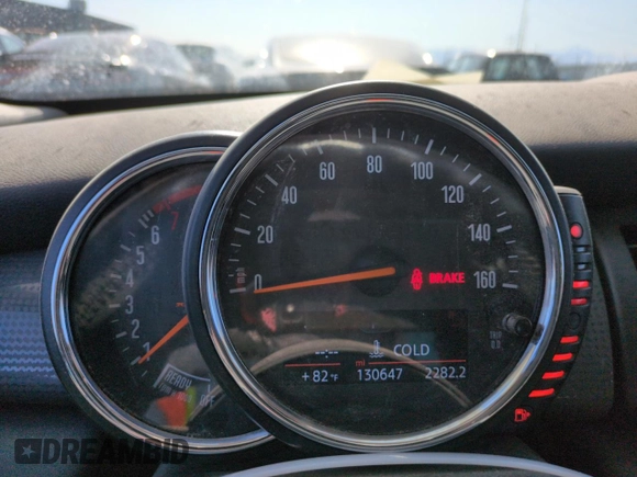 2015 MINI Hardtop 4 Door with VIN WMWXS5C51FT827202, listed as a Copart auction lot 59226065 with 130,647 mi miles and Salvage title. Bid and sale history available at DreamBid. Image 9.