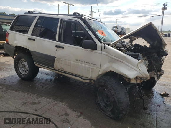 1996 Jeep Grand Cherokee Laredo with VIN 1J4GZ58S9TC277492, listed as a Copart auction lot 66732404 with Not provided miles and Salvage title. Bid and sale history available at DreamBid. Image 4.
