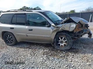 2003 GMC Envoy SLT with VIN 1GKDS13SX32203909, listed as a IAAI auction lot 41457713 with 199,507 mi miles. Bid and sale history available at carsss.com. Image 14.