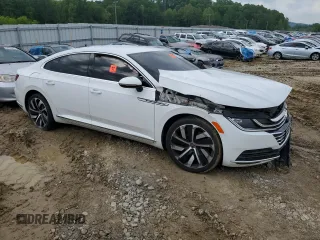 2019 Volkswagen Arteon SE z VIN WVWBR7AN1KE000435, wystawiony jako Copart lot #55991645 z przebiegiem 70 285 mil mil oraz Czysty tytuł • Clean title. Historia ofert i sprzedaży dostępna na DreamBid. Obrazek 4.