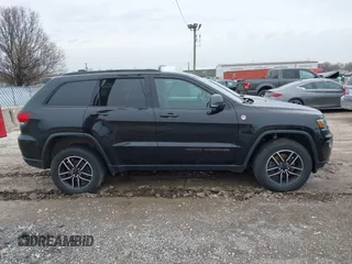 2019 Jeep Grand Cherokee Trailhawk with VIN 1C4RJFLT3KC554292, listed as a IAAI auction lot 41953049 with 31,672 mi miles and . Bid and sale history available at DreamBid. Image 13.
