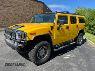 2003 Hummer H2 with VIN 5GRGN23UX3H112710, listed as a Copart auction lot 72082654 with 64,186 mi miles and Salvage Title. Bid and sale history available at carsss.com. Image 2.