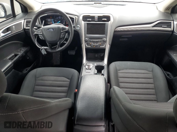 2018 Ford Fusion SE z VIN 3FA6P0LU2JR234975, wystawiony jako Copart lot #52562945 z przebiegiem 148 801 mil mil oraz Szkoda całkowita • Salvage title. Historia ofert i sprzedaży dostępna na DreamBid. Obrazek 8.