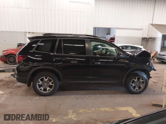 2023 Honda Passport TrailSport with VIN 5FNYF8H64PB016819, listed as a IAAI auction lot 41997402 with 22,106 mi miles and . Bid and sale history available at DreamBid. Image 14.