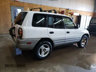 2000 Toyota RAV4 z VIN JT3GP10V5Y0049271, wystawiony jako Copart lot #56158045 z przebiegiem 188 900 mil mil oraz Czysty tytuł • Clean title. Historia ofert i sprzedaży dostępna na DreamBid. Obrazek 3.