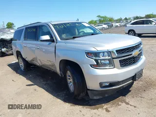 2017 Chevrolet Suburban LT z VIN 1GNSKHKC9HR268651, wystawiony jako IAAI lot #42125406 z przebiegiem 174 451 mil mil oraz . Historia ofert i sprzedaży dostępna na DreamBid. Obrazek 1.
