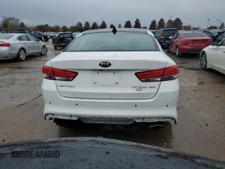 2016 Kia Optima EX with VIN 5XXGU4L31GG097296, listed as a Copart auction lot 74909523 with 79,450 mi miles and Salvage Title. Bid and sale history available at carsss.com. Image 6.