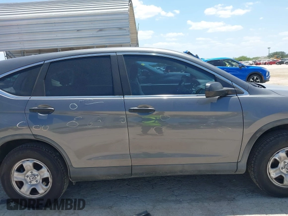 2013 Honda CR-V LX with VIN 3CZRM3H37DG708916, listed as a IAAI auction lot 42450090 with 118,002 mi miles and . Bid and sale history available at DreamBid. Image 13.