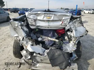 2015 Chevrolet Cruze LS z VIN 1G1PA5SH7F7300851, wystawiony jako Copart lot #48953325 z przebiegiem 95 547 mil mil oraz Szkoda całkowita • Salvage title. Historia ofert i sprzedaży dostępna na DreamBid. Obrazek 6.