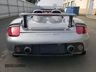 2004 Porsche Carrera GT z VIN WP0CA29894L001019, wystawiony jako Copart lot #52988584 z przebiegiem 4486 mil mil oraz Szkody całkowita. Historia ofert i sprzedaży dostępna na DreamBid. Obrazek 6.