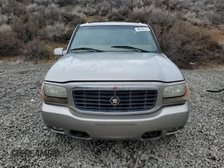 2000 Cadillac Escalade z VIN 1GYEK13RXYR103671, wystawiony jako Copart lot #48146125 z przebiegiem 271 195 mil mil oraz Szkoda całkowita • Salvage title. Historia ofert i sprzedaży dostępna na DreamBid. Obrazek 5.