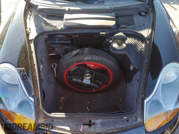 2000 Porsche Boxster z VIN WP0CA2983YU621686, wystawiony jako Copart lot #88951585 z przebiegiem 127 276 mil mil oraz Tytuł czysty. Historia ofert i sprzedaży dostępna na DreamBid. Obrazek 11.