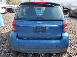2008 Smart fortwo Pure z VIN WMEEJ31X08K095175, wystawiony jako Copart lot #52931165 z przebiegiem 102 299 mil mil oraz Szkody całkowita. Historia ofert i sprzedaży dostępna na DreamBid. Obrazek 6.