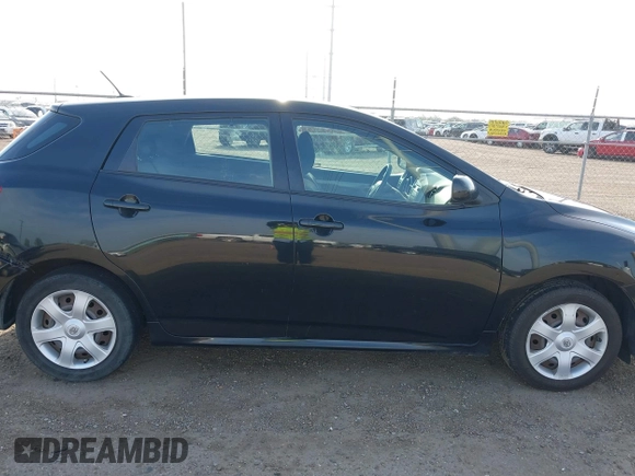 2009 Toyota Matrix with VIN 2T1KU40E69C091858, listed as a IAAI auction lot 41925490 with 153,161 mi miles. Bid and sale history available at carsss.com. Image 13.