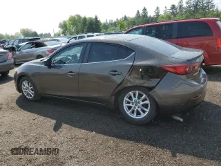 2014 Mazda 3 i Touring with VIN JM1BM1V79E1151770, listed as a Copart auction lot 60100155 with 274,752 mi miles and Salvage title. Bid and sale history available at DreamBid. Image 2.