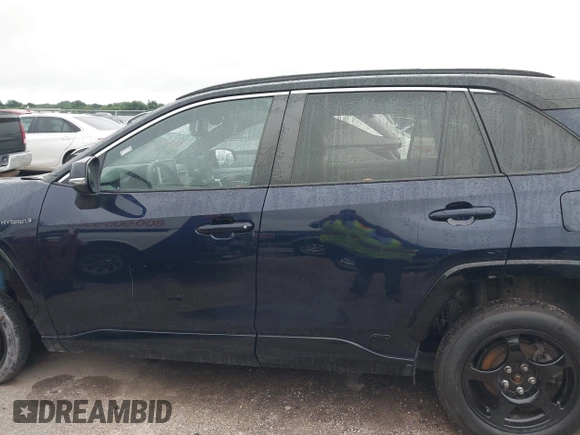 2021 Toyota RAV4 Hybrid XSE with VIN 2T3E6RFV5MW002856, listed as a IAAI auction lot 42387921 with Not provided miles and . Bid and sale history available at DreamBid. Image 13.