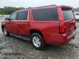 2015 Chevrolet Suburban LT with VIN 1GNSCJKC2FR306223, listed as a Copart auction lot 58733475 with 191,330 mi miles and Salvage title. Bid and sale history available at DreamBid. Image 2.