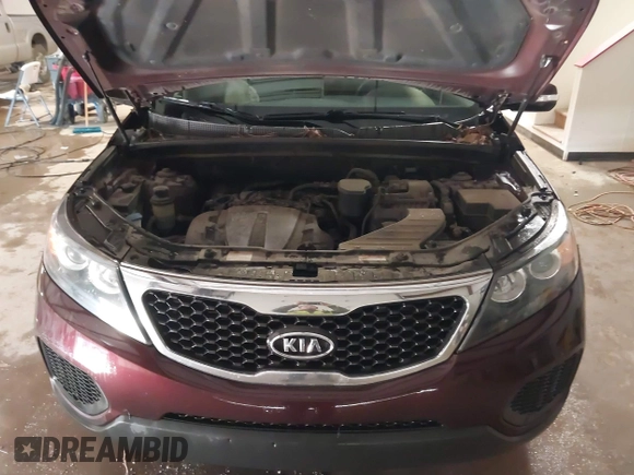 2013 Kia Sorento LX with VIN 5XYKT4A27DG315059, listed as a IAAI auction lot 41571574 with 217,527 mi miles. Bid and sale history available at carsss.com. Image 10.