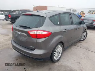 2013 Ford C-Max SE with VIN 1FADP5AUXDL535889, listed as a IAAI auction lot 42161407 with 103,978 mi miles and . Bid and sale history available at DreamBid. Image 4.