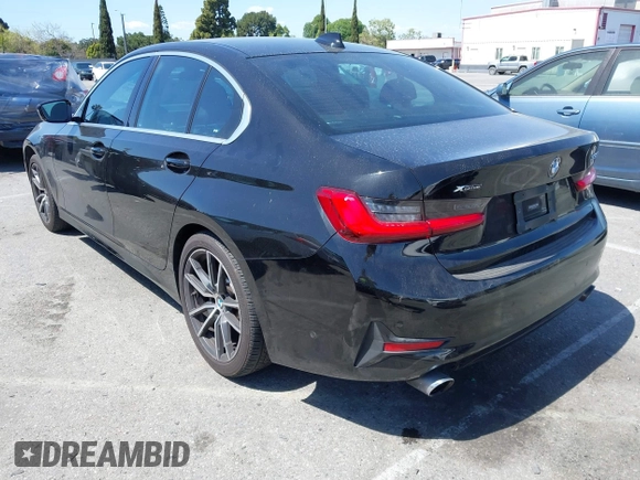 2019 BMW 3 Series 330i xDrive with VIN WBA5R7C5XKAJ78505, listed as a IAAI auction lot 41955059 with 53,216 mi miles. Bid and sale history available at carsss.com. Image 3.