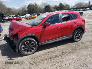 2016 Mazda CX-5 Grand Touring with VIN JM3KE2DY5G0692554, listed as a Copart auction lot 51322475 with 128,086 mi miles and Salvage Title. Bid and sale history available at carsss.com. Image 1.