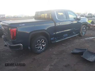 2023 GMC Sierra 1500 SLT z VIN 3GTUUDE89PG263119, wystawiony jako IAAI lot #41455629 z przebiegiem 25 629 mil mil oraz . Historia ofert i sprzedaży dostępna na DreamBid. Obrazek 4.